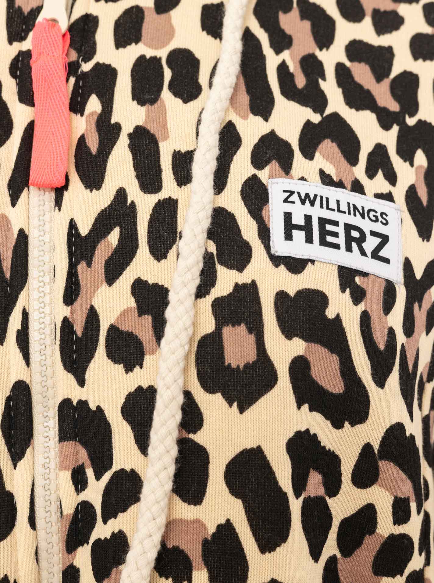 Zwillingsherz - Hoodiemantel "Leo Allover" - Beige/Schwarz