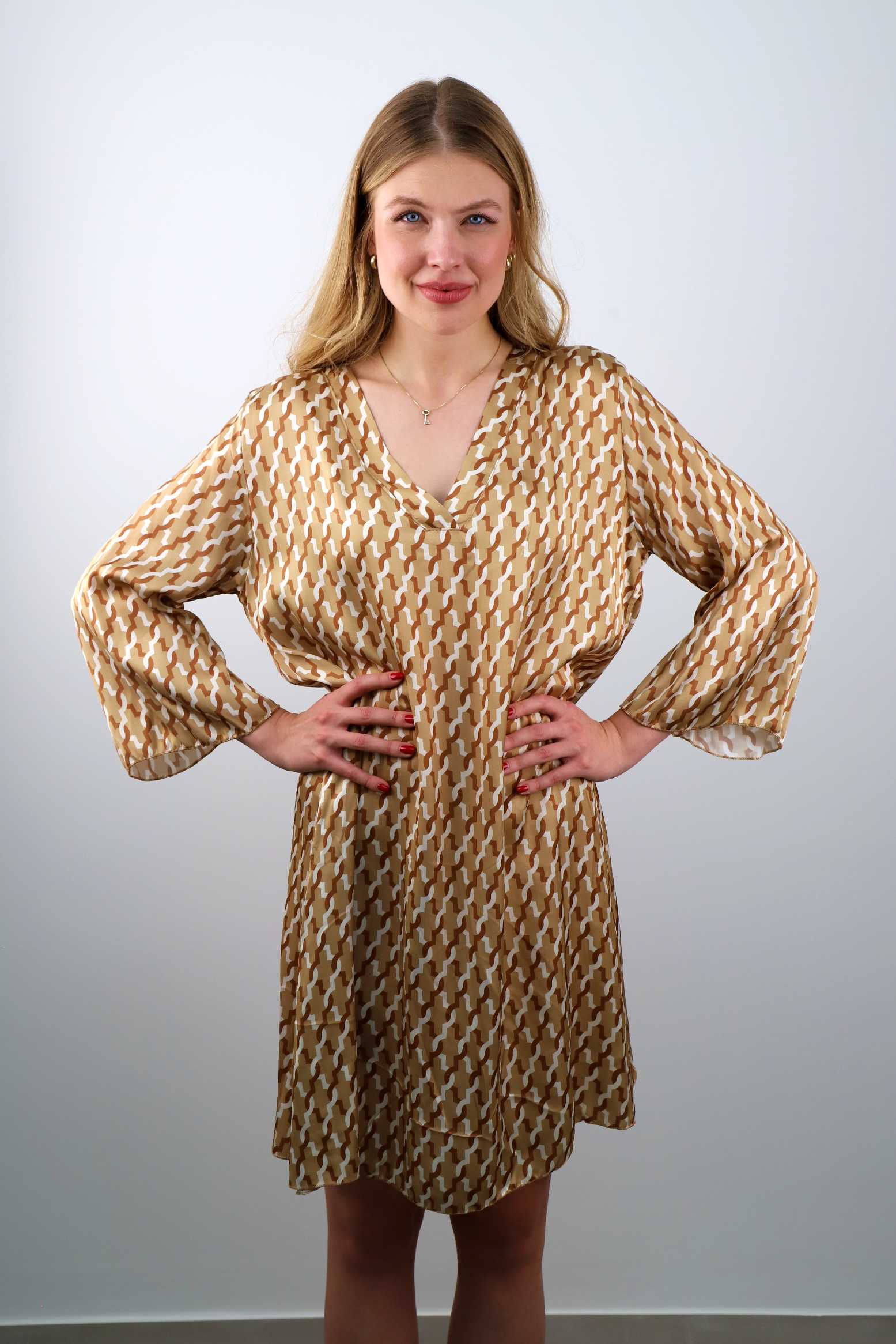 Kleid mit Muster - Beige