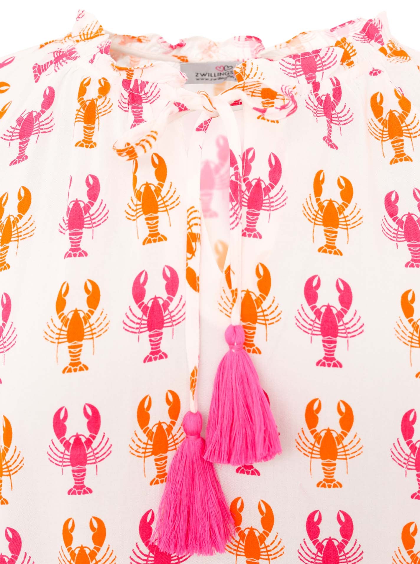Zwillingsherz Bluse Lobster Zweifarbig Weiß-Orange mit Tasseln – Detailansicht des Musters