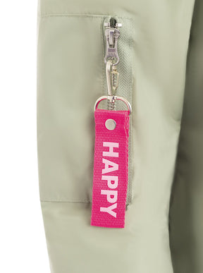 Zwillingsherz Bomberjacke Happy in Salbei, Detailansicht der Tasche mit Druckknopfleiste im sportiven Stil