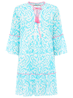 Zwillingsherz Kleid mit Ornamenten in Türkis und Pink, dekorative Kordeln und verspielte Tasseln